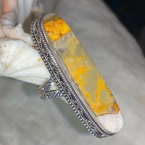 Elegant Silver Ring with Yellow Accents